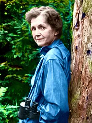 Rachel Carson leaning against a tree