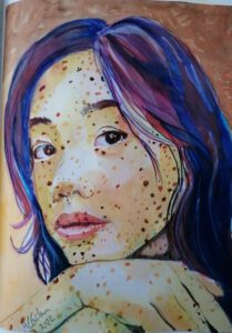 Girl with a freckled face