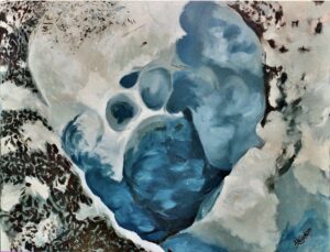 A deep blue hole in a glacier