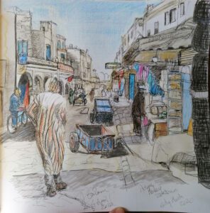 A man in a djellaba walks away from the viewer. drawing in coloured pencil over ink.
