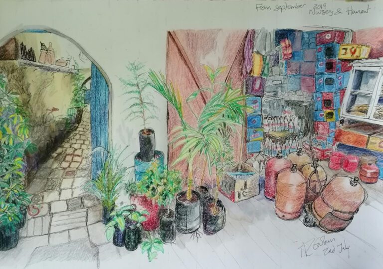 An arch leading to a passageway next to a small shop. Watercolour and coloured pencil.