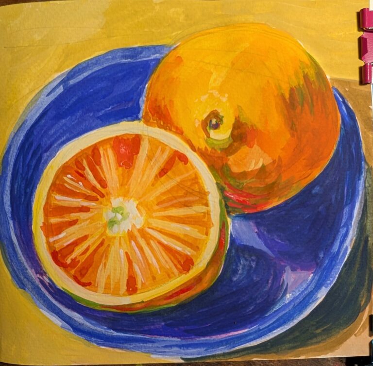 Oranges on a blue plate