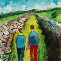 Two young people walking in the country