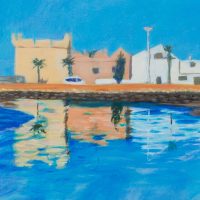 Some buildings reflected in sea water