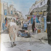 A man in a djellaba walks away from the viewer. drawing in coloured pencil over ink.