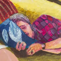 A woman asleep on her side.